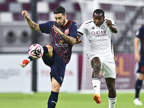 AL-SADD SC VS AL DUHAIL SC-OOREDOO STARS LEAGUE QATAR Mohamed Camara (R) of Al-Sadd SC and Luis Alberto (L) of Al Duhail SC in action during the Ooredoo Qatar Stars League 24 25 match between Al-Sadd SC and Al Duhail SC at Jassim bin Hamad Stadium in Doha, Qatar, on September 21, 2024. DOHA Qatar Copyright: xNOUSHADx