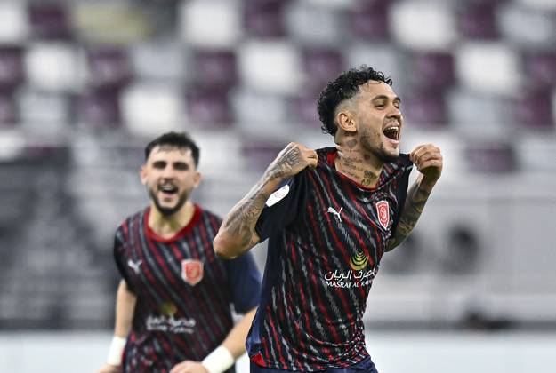 AL-SADD SC VS AL DUHAIL SC-OOREDOO STARS LEAGUE QATAR Edmilson Junior Paulo (R) of Al Duhail SC celebrates after scoring the second goal during the Ooredoo Qatar Stars League 24 25 match between Al-Sadd SC and Al Duhail SC at Jassim bin Hamad Stadium in Doha, Qatar, on September 21, 2024. DOHA Qatar Copyright: xNOUSHADx