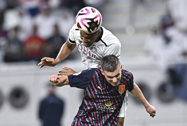 AL-SADD SC VS AL DUHAIL SC-OOREDOO STARS LEAGUE QATAR Pedro Miguel Correia (L) of Al-Sadd SC and Benjamin Bourigeaud (R) of Al Duhail SC in action during the Ooredoo Qatar Stars League 24 25 match between Al-Sadd SC and Al Duhail SC at Jassim bin Hamad Stadium in Doha, Qatar, on September 21, 2024. DOHA Qatar Copyright: xNOUSHADx