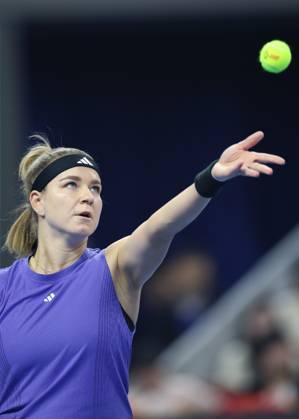 (241005) -- BEIJING, Oct. 5, 2024 -- Karolina Muchova of the Czech Republic serves during the women s singles semifinal match against Zheng Qinwen of China at 2024 China Open tennis tournament in Beijing, capital of China, Oct. 5, 2024. ) (SP)CHINA-BEIJING-TENNIS-CHINA OPEN-WOMEN S SINGLES(CN) BaixXuefei