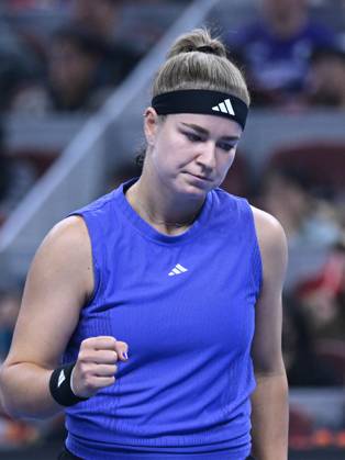 (241005) -- BEIJING, Oct. 5, 2024 -- Karolina Muchova of the Czech Republic reacts during the women s singles semifinal match against Zheng Qinwen of China at 2024 China Open tennis tournament in Beijing, capital of China, Oct. 5, 2024. ) (SP)CHINA-BEIJING-TENNIS-CHINA OPEN-WOMEN S SINGLES(CN) ZhangxLong