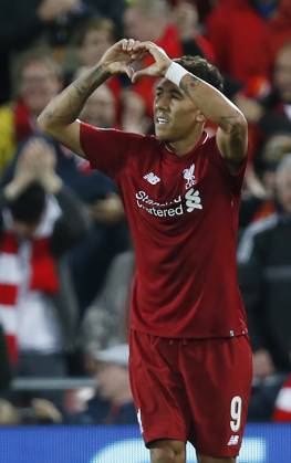 Liverpool v Paris Saint-Germain - UEFA Champions League - Group C - Anfield September 18, 2018 - Liverpool, United Kingdom - Liverpool forward Roberto Firmino celebrates celebrating scoring the third and winning goal during the UEFA Champions League - Group C match at the Anfield Stadium, Liverpool. Picture date 18th September 2018. Picture credit should read: Andrew Yates Sportimage Liverpool United Kingdom EDITORIAL USE ONLY Copyright: xx ZUMA-20180918_zaf_si1_089.jpg AndrewxYatesx csmphototwo437306