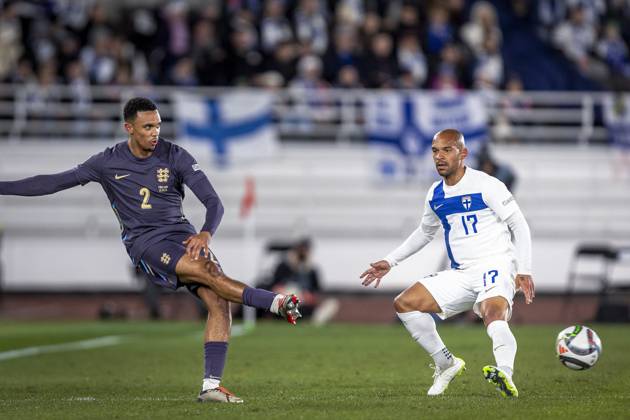 Trent Alexander-Arnold of England and Nikolai Alho of Finland during the UEFA Nations League Group B2 match between Finland and England at the Helsinki Olympic Stadium 13. October 2024 in Helsinki, Finland. (Mauri Forsblom Newspix24) Copyright: xKallexParkkinenx NP24_02812371