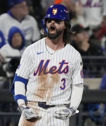 Sport Bilder des Tages New York Mets Jesse Winker celebrates on third base after hitting an rbi-triple to give the Mets a 9-2 lead over the Los Angles Dodgers in the fourth inning in game five of the MLB, Baseball Herren, USA NLCS at Citi Field in New York City on Friday, October 18, 2024.  NYP20241018228 RAYxSTUBBLEBINE