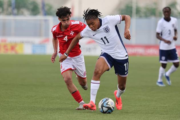 TA™ QALI, MALTA - OCTOBER 24: Rio Ngumoha (R) of England moves away with the ball from Matteas Caruana of Malta during the UEFA European Under-17 Championship 2025 Group 1 qualifying soccer match between England and Malta at the Centenary Stadium, Ta™ Qali, Malta on October 24, 2024. England v Malta - Under-17 Championship UEFA Qualifying 2025 UEFA_U17_QLFY_25
