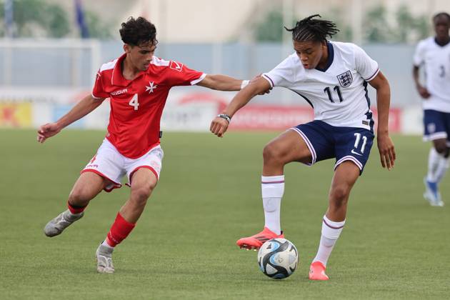 TA™ QALI, MALTA - OCTOBER 24: Rio Ngumoha (R) of England moves away with the ball from Matteas Caruana of Malta during the UEFA European Under-17 Championship 2025 Group 1 qualifying soccer match between England and Malta at the Centenary Stadium, Ta™ Qali, Malta on October 24, 2024. England v Malta - Under-17 Championship UEFA Qualifying 2025 UEFA_U17_QLFY_25