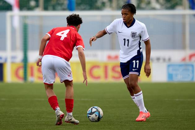 TA™ QALI, MALTA - OCTOBER 24: Rio Ngumoha (R) of England takes on Matteas Caruana of Malta during the playing of their country™s national anthem prior to the UEFA European Under-17 Championship 2025 Group 1 qualifying soccer match between England and Malta at the Centenary Stadium, Ta™ Qali, Malta on October 24, 2024. England v Malta - Under-17 Championship UEFA Qualifying 2025 UEFA_U17_QLFY_25