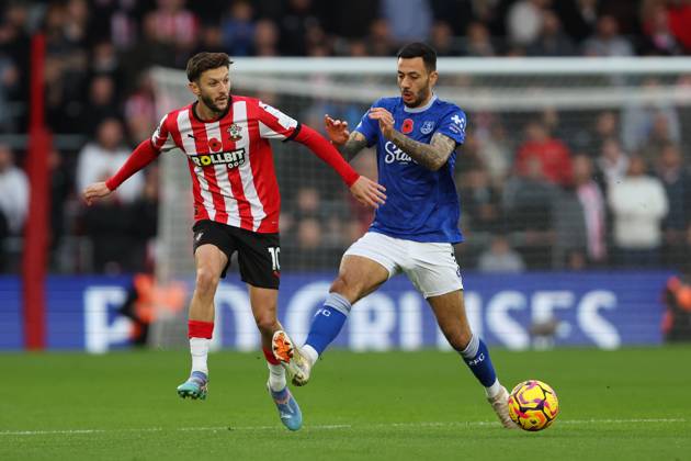 Football - 2024 2025 Premier League - Southampton vs Everton - St Mary™s Stadium - Saturday 2nd November 2024 Adam Lallana of Southampton and Dwight McNeil of Everton in action during the Premier League match at St Mary™s Stadium COLORSPORT Shaun Boggust