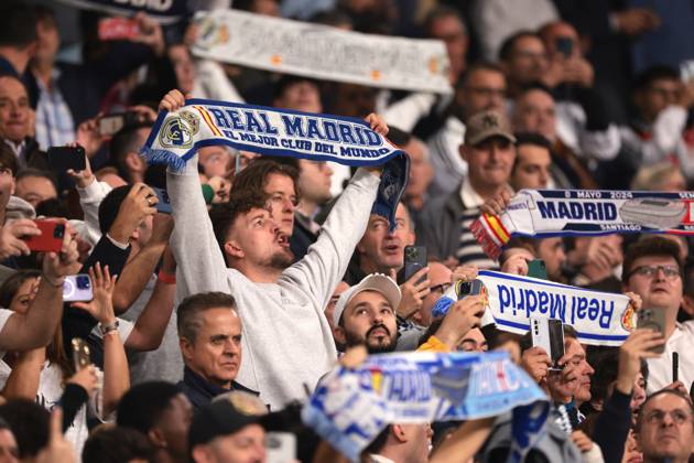 Madrid, Spain, 5th November 2024. Real Madrid fans hold aloft scarves prior to kick off in the UEFA Champions League match at the Santiago Bernabau, Madrid. Picture credit should read: Jonathan Moscrop Sportimage EDITORIAL USE ONLY. No use with unauthorised audio, video, data, fixture lists, club league logos or live services. Online in-match use limited to 120 images, no video emulation. No use in betting, games or single club league player publications. SPI-3425-0053