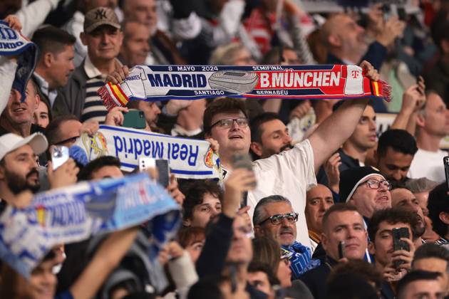 Madrid, Spain, 5th November 2024. Real Madrid fans hold aloft scarves prior to kick off in the UEFA Champions League match at the Santiago Bernabau, Madrid. Picture credit should read: Jonathan Moscrop Sportimage EDITORIAL USE ONLY. No use with unauthorised audio, video, data, fixture lists, club league logos or live services. Online in-match use limited to 120 images, no video emulation. No use in betting, games or single club league player publications. SPI-3425-0054