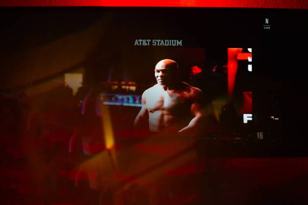November 16, 2024, Manhattan, Kansas, USA: Reflections of the Paul, Tyson fight as viewed online presented by Netflix. Jake Paul wins the fight against Mike Tyson by unanimous decision after a full eight-round heavyweight match in AT&T Stadium in front of 70,000 fans on Friday. Hosted onine by Netflix with an estimated tens of millions of viewers. Manhattan USA - ZUMAt152 20241116_znp_t152_001 Copyright: xLukexTownsendx