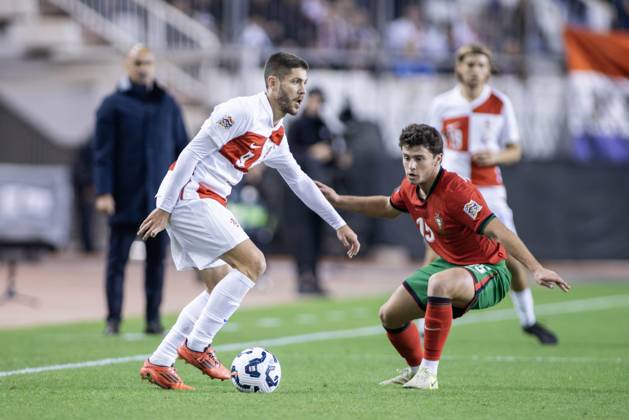 November 18, 2024, Split, Croatia: Nations League - League A, Group A1 - Croatia vs Portugal 1:1. - On photo Croatian Andrej Kramaric 9 and Portuguese Joao Neves 15. Split Croatia - ZUMALEAG 20241118_mda_p210_422 Copyright: xMajaxPrgometx