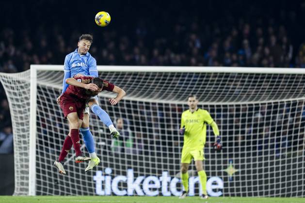 Italy: Serie a football match SSC Napoli vs AS Roma Napoli s Kosovar defender Amir Rrahmani challenges for the ball with Roma™s Italian midfielder Bryan Cristante during the Serie A football match between SSC Napoli and AS Roma at the Diego Armando Maradona Stadium in Naples, November 24, 2024. ABPH8100 Copyright: xAntonioxBalascox