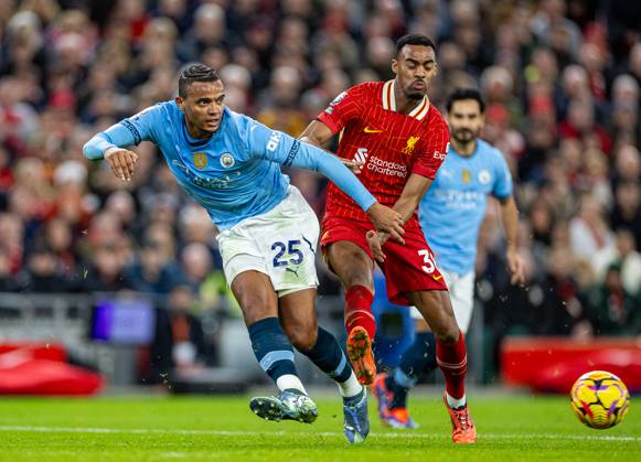Football - FA Premier League - Liverpool FC v Manchester City FC LIVERPOOL, ENGLAND - Sunday, December 1, 2024: Manchester City s Manuel Akanji (L) is challenged by Liverpool s Ryan Gravenberch during the FA Premier League match between Liverpool FC and Manchester City FC at Anfield. (Photo by David Rawcliffe Propaganda) LIVERPOOL Anfield MERSEYSIDE ENGLAND  Copyright: xDavidxRawcliffex P2024-12-01-Liverpool_Man_City-14