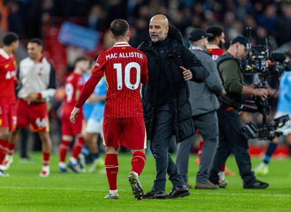 Football - FA Premier League - Liverpool FC v Manchester City FC LIVERPOOL, ENGLAND - Sunday, December 1, 2024: Manchester City s manager Josep Pep Guardiola (R) shakes hands with Liverpool s Alexis Mac Allister after the FA Premier League match between Liverpool FC and Manchester City FC at Anfield. Liverpool won 2-0. (Photo by David Rawcliffe Propaganda) LIVERPOOL Anfield MERSEYSIDE ENGLAND  Copyright: xDavidxRawcliffex P2024-12-01-Liverpool_Man_City-43