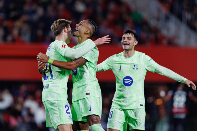 December 3, 2024, Palma De Mallorca, Spain: Frenkie De Jong, Raphinha, Pedri FC Barcelona, Barca celebrate after scoring a goal during the LaLiga EA SPORTS game between RCD Mallorca and FC Barcelona at Estadi Mallorca Son Moix. Final scores RCD Mallorca 1-5 FC Barcelona. Palma De Mallorca Spain - ZUMAs197 20241203_aaa_s197_425 Copyright: xMaciejxRogowskix