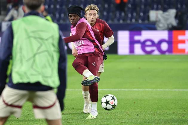 SOCCER - UEFA CL, RBS vs PSG SALZBURG,AUSTRIA,10.DEC.24 - SOCCER - UEFA Champions League, Red Bull Salzburg vs Paris Saint German. Image shows Lucas Gourna-Douath and Mads Bidstrup (RBS) during warm up. GEPAxpictures xDavidxGeieregger
