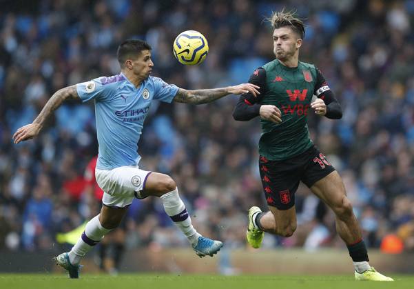 Manchester City v Aston Villa - Premier League - Etihad Stadium October 26, 2019, Manchester, United Kingdom: Joao Cancelo of Manchester City challenges Jack Grealish of Aston Villa during the Premier League match at the Etihad Stadium, Manchester. Picture date: 26th October 2019. Picture credit should read: Darren Staples Sportimage Manchester United Kingdom EDITORIAL USE ONLY Copyright: xx ZUMA-20191026_zaf_si1_039.jpg DarrenxStaplesx csmphototwo600935