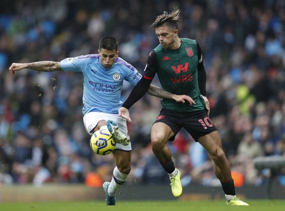 Manchester City v Aston Villa - Premier League - Etihad Stadium October 26, 2019, Manchester, United Kingdom: Joao Cancelo of Manchester City challenges Jack Grealish of Aston Villa during the Premier League match at the Etihad Stadium, Manchester. Picture date: 26th October 2019. Picture credit should read: Darren Staples Sportimage Manchester United Kingdom EDITORIAL USE ONLY Copyright: xx ZUMA-20191026_zaf_si1_040.jpg DarrenxStaplesx csmphototwo600937