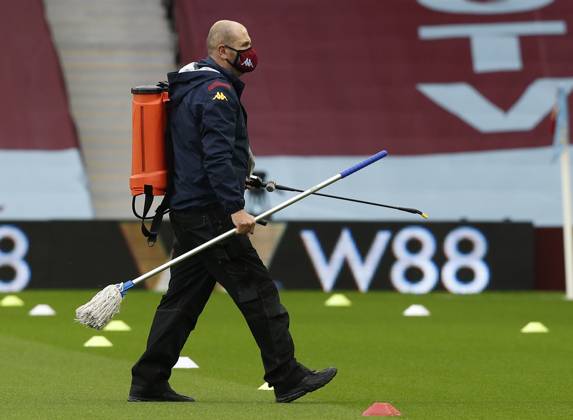Aston Villa v Manchester United, ManU - Premier League - Villa Park July 9, 2020, Birmingham, United Kingdom: A disinfecting cleaner walks across the pitch during the Premier League match at Villa Park, Birmingham. Picture date: 9th July 2020. Picture credit should read: Darren Staples Sportimage Birmingham United Kingdom EDITORIAL USE ONLY Copyright: xx ZUMA-20200709_zaf_si1_097.jpg DarrenxStaplesx csmphototwo676958