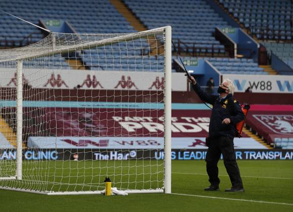 Aston Villa v Manchester United, ManU - Premier League - Villa Park July 9, 2020, Birmingham, United Kingdom: Disenfecting goal posts during the Premier League match at Villa Park, Birmingham. Picture date: 9th July 2020. Picture credit should read: Darren Staples Sportimage Birmingham United Kingdom EDITORIAL USE ONLY Copyright: xx ZUMA-20200709_zaf_si1_114.jpg DarrenxStaplesx csmphototwo676977