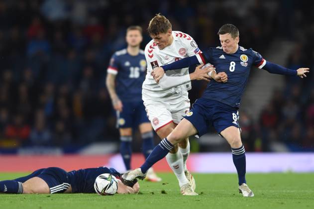 Scotland v Denmark - FIFA World Cup, WM, Weltmeisterschaft, Fussball qualifying - European - Hampden Park November 15, 2021, Glasgow, United Kingdom: Glasgow, Scotland, 15th November 2021. John McGinn of Scotland, Jannik Vestergaard of Denmark and Callum McGregor of Scotland during the FIFA World Cup qualifiers match at Hampden Park, Glasgow. Picture credit should read: Neil Hanna Sportimage Glasgow United Kingdom EDITORIAL USE ONLY Copyright: xx ZUMA-20211115_zaf_si1_093.jpg NeilxHannax csmphototwo822941