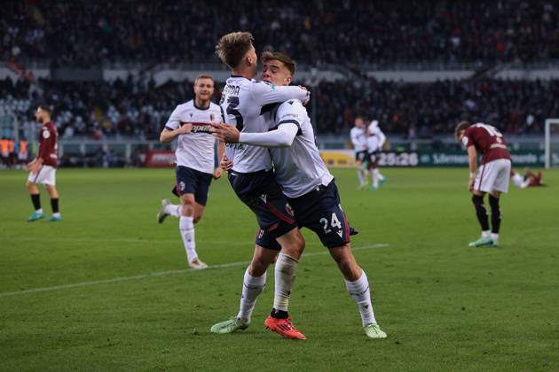 Turin, Italy, 21st December 2024. Thijs Dallinga of Bologna FC celebrates with team mate Juan Miranda after scoring to give the side a 1-0 lead during the Serie A match at Stadio Grande Torino, Turin. Picture credit should read: Jonathan Moscrop Sportimage EDITORIAL USE ONLY. No use with unauthorised audio, video, data, fixture lists, club league logos or live services. Online in-match use limited to 120 images, no video emulation. No use in betting, games or single club league player publications. SPI-3533-0019
