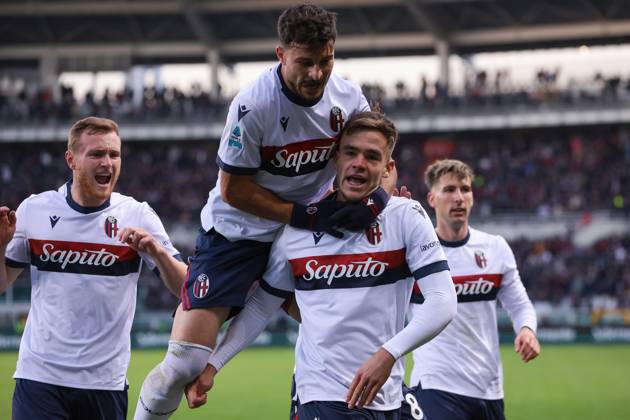 Turin, Italy, 21st December 2024. Thijs Dallinga of Bologna FC celebrates with team mates Tommaso Pobega, Riccardo Orsolini and Juan Miranda after scoring to give the side a 1-0 lead during the Serie A match at Stadio Grande Torino, Turin. Picture credit should read: Jonathan Moscrop Sportimage EDITORIAL USE ONLY. No use with unauthorised audio, video, data, fixture lists, club league logos or live services. Online in-match use limited to 120 images, no video emulation. No use in betting, games or single club league player publications. SPI-3533-0020