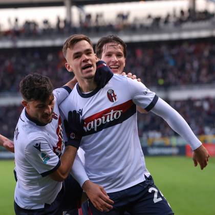 Turin, Italy, 21st December 2024. Thijs Dallinga of Bologna FC celebrates with team mates Riccardo Orsolini and Juan Miranda after scoring to give the side a 1-0 lead during the Serie A match at Stadio Grande Torino, Turin. Picture credit should read: Jonathan Moscrop Sportimage EDITORIAL USE ONLY. No use with unauthorised audio, video, data, fixture lists, club league logos or live services. Online in-match use limited to 120 images, no video emulation. No use in betting, games or single club league player publications. SPI-3533-0022