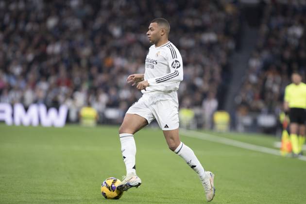 LA LIGA EA Sports - Real Madrid vs Sevilla MADRID, SPAIN - December 22: Kylian Mbappe of Real Madrid in action during the La Liga 2024 25 match between Real Madrid and Sevilla at Santiago Bernabeu Stadium. (Photo by Guillermo Martinez) Madrid Santiago BernabÃ u Stadium Spain Copyright: xGuillermoxMartinezx