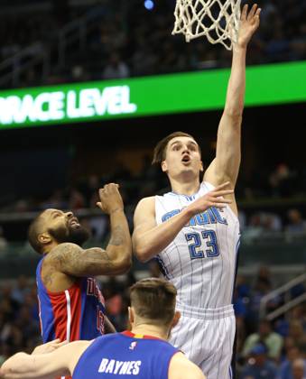Detroit Pistons at Orlando Magic Orlando guard Mario Hezonja (23) attempts a shot over Detroit forward Marcus Morris (13) and center Aron Baynes (12) on Wednesday, April 6, 2016, at the Amway Center in Orlando, Fla. (Charles King Orlando Sentinel TNS) Orlando FL USA EDITORIAL USE ONLY Copyright: xx 1183022 CharlesxKingx krtphotoslive749776
