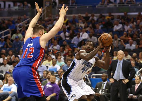 Detroit Pistons at Orlando Magic Orlando forward Andrew Nicholson (44) pump fakes while defended by Detroit center Aron Baynes (12) on Wednesday, April 6, 2016, at the Amway Center in Orlando, Fla. (Charles King Orlando Sentinel TNS) Orlando FL USA EDITORIAL USE ONLY Copyright: xx 1183022 CharlesxKingx krtphotoslive749777