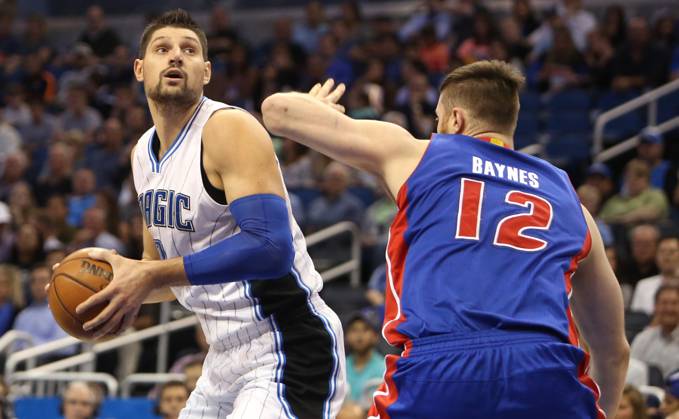 Detroit Pistons at Orlando Magic Orlando center Nikola Vucevic (9) eyes the basket while guarded by Detroit center Aron Baynes (12) on Wednesday, April 6, 2016, at the Amway Center in Orlando, Fla. (Charles King Orlando Sentinel TNS) Orlando FL USA EDITORIAL USE ONLY Copyright: xx 1183022 CharlesxKingx krtphotoslive749787