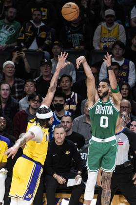 January 23, 2025, Los Angeles, California, United States: Boston Celtics Jayson Tatum 0 shoots against Los Angeles Lakers Anthony Davis 3 during an NBA, Basketball Herren, USA basketball game at Crypto.com Arena. Final score; Lakers 117:96 Celtics Los Angeles United States - ZUMAs197 20250123_aaa_s197_389 Copyright: xRingoxChiux