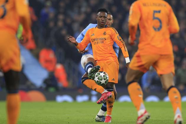 Manchester City v Real Madrid Champions League 11 02 2025. Vinicius Junior (7) of Real Madrid is challenged by Manuel Akanji (25) of Manchester City during the Champions League match between Manchester City and Real Madrid at the Etihad Stadium, Manchester, England on 11 February 2025. Manchester Etihad Stadium Manchester England Editorial use only , Copyright: xConorxMolloyx PSI-21439-0034