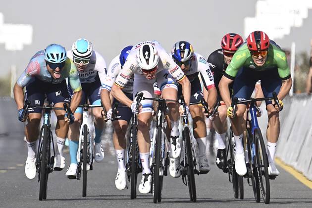 UAE Tour 2025 - Stage 5 DUBAI, UNITED ARAB EMIRATES - FEBRUARY 20 : Merlier Tim (BEL) of Soudal Quick-Step wins, Malucelli Matteo (ITA) of XDS Astana Team, Milan Jonathan (ITA) of Lidl-Trek, Welsford Sam (AUS) of Red Bull - Bora - Hansgrohe, Kogut Oded (ISR) of Israel - Premier Tech during Stage 5 of the UAE Tour 2025 cycling race with start in American University in Dubai and finish in Hamdan Bin Mohammed Smart University (160 km) on February 20, 2025 in Dubai, United Arab Emirates, 20 02 2025 Dubai United Arab Emirates  Copyright: xPeterxDexVoechtx