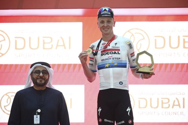 UAE Tour 2025 - Stage 5 DUBAI, UNITED ARAB EMIRATES - FEBRUARY 20 : Merlier Tim (BEL) of Soudal Quick-Step pictured during the podium ceremony of Stage 5 of the UAE Tour 2025 cycling race with start in American University in Dubai and finish in Hamdan Bin Mohammed Smart University (160 km) on February 20, 2025 in Dubai, United Arab Emirates, 20 02 2025 Dubai United Arab Emirates  Copyright: xPeterxDexVoechtx