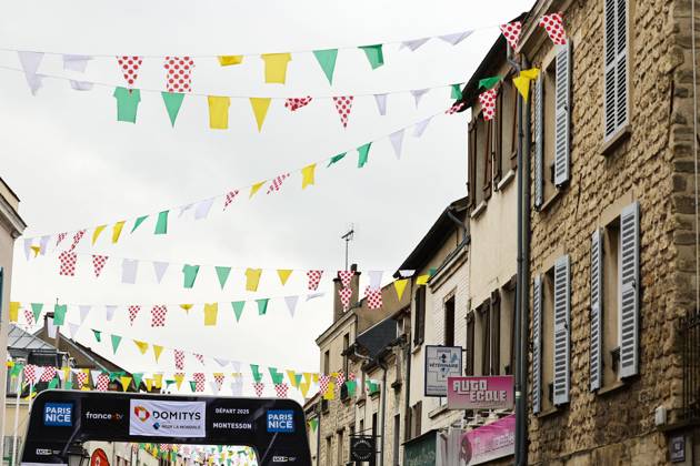 Flags pictured at the start of stage two of the 83th edition of the Paris-Nice cycling race, from Montesson to Bellegarde (183,9 km) in France, Monday 10 March 2025. DAVIDxPINTENS  x114604880x