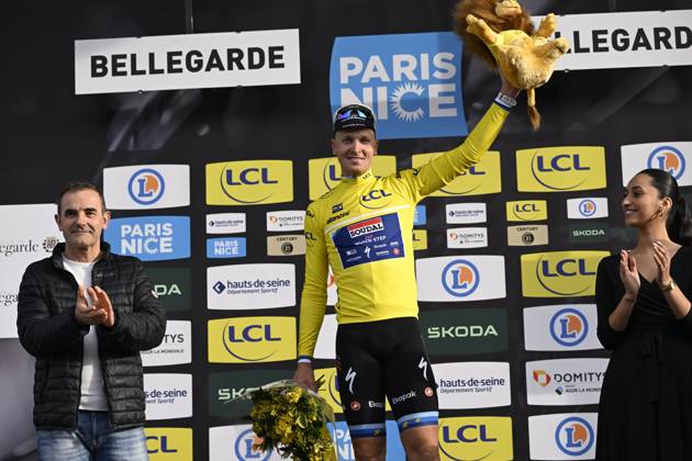 Paris - Nice 2025 - stage 2 BELLEGARDE, FRANCE - MARCH 10 : Merlier Tim (BEL) of Soudal Quick-Step on the podium with the yellow jersey during stage 2 of the 83th edition of the Paris - Nice cycling race, a stage of 183,9km with start in Montesson and finish in Bellegarde on March 10, 2025 in Bellegarde, France, 10 03 2025 ( Motordriver Kenny Verfaillie - Bellegarde France  Copyright: xNicoxVereeckenx