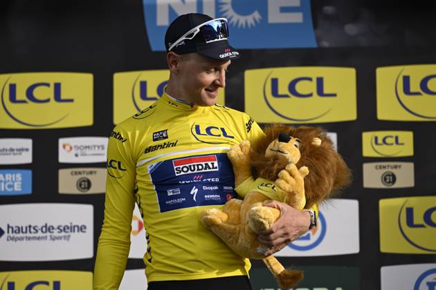 Paris - Nice 2025 - stage 2 BELLEGARDE, FRANCE - MARCH 10 : Merlier Tim (BEL) of Soudal Quick-Step on the podium with the yellow jersey during stage 2 of the 83th edition of the Paris - Nice cycling race, a stage of 183,9km with start in Montesson and finish in Bellegarde on March 10, 2025 in Bellegarde, France, 10 03 2025 ( Motordriver Kenny Verfaillie - Bellegarde France  Copyright: xNicoxVereeckenx