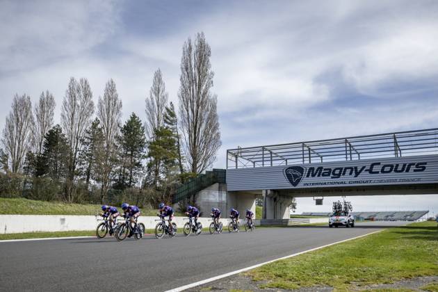 Team Picnic PostNL riders pictured during the warming up ahead of stage three of the 83th edition of the Paris-Nice cycling race, a 28,4km team time trial at the Nevers Magny-Cours racetrack, in Nevers, France, Tuesday 11 March 2025. DAVIDxPINTENS  x114676065x