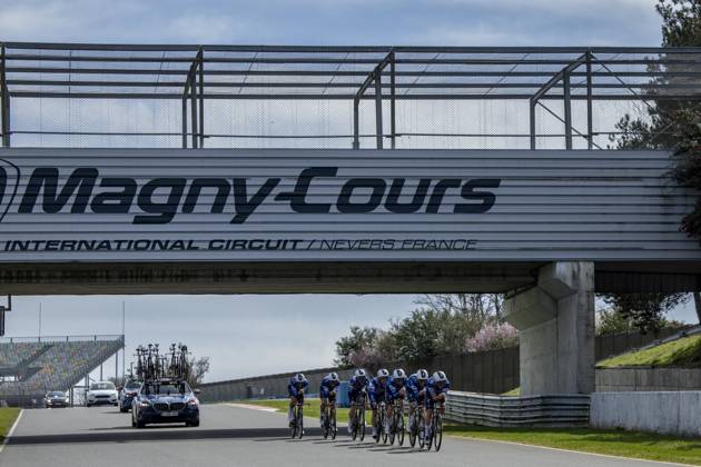 Soudal Quick-Step riders pictured during the warming up ahead of stage three of the 83th edition of the Paris-Nice cycling race, a 28,4km team time trial at the Nevers Magny-Cours racetrack, in Nevers, France, Tuesday 11 March 2025. DAVIDxPINTENS  x114676792x