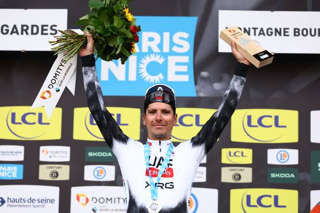 Portuguese Joao Almeida of UAE Team Emirates celebrates on the podium after winning stage four of the 83th edition of the Paris-Nice cycling race, 163,4km from Vichy to La Loge des Gardes, France, Wednesday 12 March 2025. DAVIDxPINTENS  x114782046x