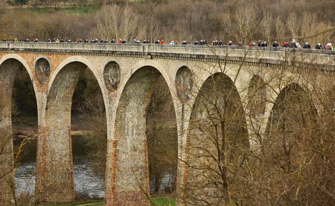 The pack of riders pictured in action during stage five of the 83th edition of the Paris-Nice cycling race, 196,5 km from Saint-Just-en-Chevalet to La Cote-Saint-Andre, France, Thursday 13 March 2025. DAVIDxPINTENS  x114853496x
