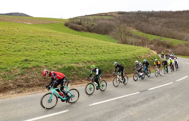 Australian Miles Scotson of Arkea-BB Hotels, Spanish Joel Nicolau of Caja Rural-Seguros RGA and Uruguayan Thomas Silva of Caja Rural-Seguros RGA pictured in action during stage five of the 83th edition of the Paris-Nice cycling race, 196,5 km from Saint-Just-en-Chevalet to La Cote-Saint-Andre, France, Thursday 13 March 2025. DAVIDxPINTENS  x114859024x