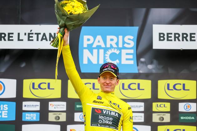 American Matteo Jorgenson of Team Visma-Lease a Bike celebrates on the podium in the yellow jersey of leader in the overall ranking after stage six of the 83th edition of the Paris-Nice cycling race, 209,8 km from Saint-Julien-en-Saint-Alban to Berre l Etang, France, Friday 14 March 2025. DAVIDxPINTENS  x114941564x
