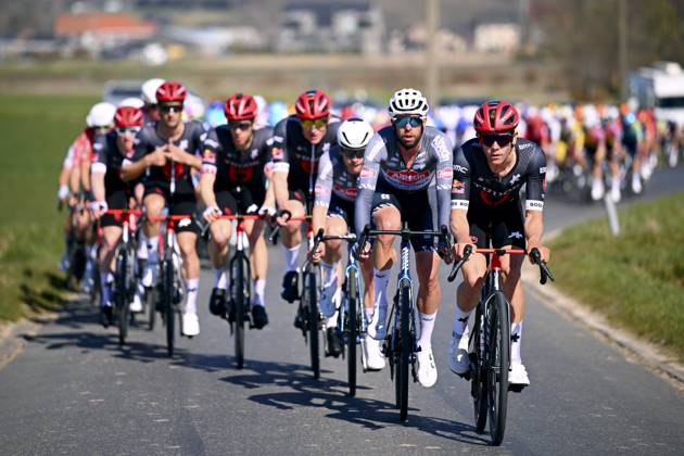 Danilith Nokere Koerse 2025 cycling race NOKERE, BELGIUM - MARCH 19 : rider of Tudor Pro Cycling Team and rider of Alpecin-Deceuninck during the Men Elite UCI 1.Pro 78th Danilith Nokere Koerse cycling race with start in Deinze and finish in Nokere (188,2 km) on March 19, 2025 in Nokere, Belgium, 19 03 2025 ( Motordriver Rodrique Verfaillie & Nokere Belgium  Copyright: xTomasxSiskx