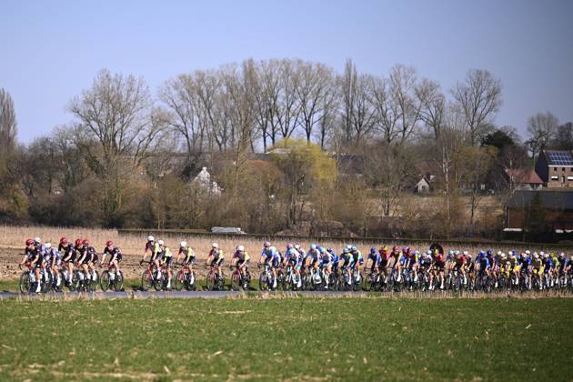 Danilith Nokere Koerse 2025 cycling race NOKERE, BELGIUM - MARCH 19 : illustration picture peloton during the Men Elite UCI 1.Pro 78th Danilith Nokere Koerse cycling race with start in Deinze and finish in Nokere (188,2 km) on March 19, 2025 in Nokere, Belgium, 19 03 2025 ( Motordriver Rodrique Verfaillie & Nokere Belgium  Copyright: xTomasxSiskx