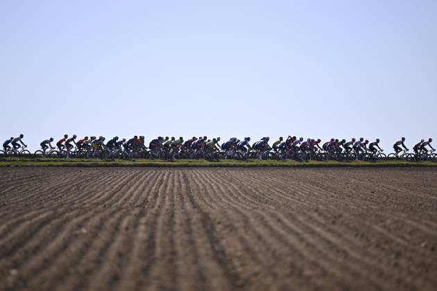 Danilith Nokere Koerse 2025 cycling race NOKERE, BELGIUM - MARCH 19 : illustration picture peloton during the Men Elite UCI 1.Pro 78th Danilith Nokere Koerse cycling race with start in Deinze and finish in Nokere (188,2 km) on March 19, 2025 in Nokere, Belgium, 19 03 2025 ( Motordriver Rodrique Verfaillie & Nokere Belgium  Copyright: xTomasxSiskx