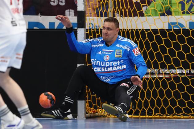 29 03 2025, xtgx, Handball Daikin HBL, VfL Potsdam HC Erlangen emspor, v l Dario Quenstedt Erlangen, 1 save, holds the ball, catches the ball, parries Potsdam